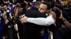 LOS ANGELES, CALIFORNIA - MAY 12: Stephen Curry #30 of the Golden State Warriors hugs LeBron James #6 of the Los Angeles Lakers after the Western Conference Semifinal Playoff game at Crypto.com Arena on May 12, 2023 in Los Angeles, California. Lakers eliminated the Warriors, 122-101. NOTE TO USER: User expressly acknowledges and agrees that, by downloading and or using this photograph, User is consenting to the terms and conditions of the Getty Images License Agreement.   Kevork Djansezian/Getty Images/AFP (Photo by KEVORK DJANSEZIAN / GETTY IMAGES NORTH AMERICA / Getty Images via AFP)