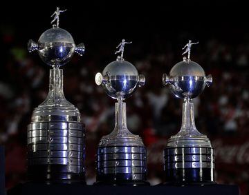 View of the three previous Copa Libertadores trophies obtained by River Plate in 1986, 1996 and 2015 at the Monumental stadium in Buenos Aires on December 23, 2018, during celebrations for their fourth Libertadores Cup victory, after beating arch rival Bo